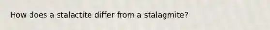 How does a stalactite differ from a stalagmite?