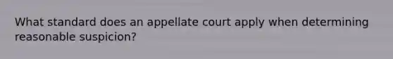 What standard does an appellate court apply when determining reasonable suspicion?