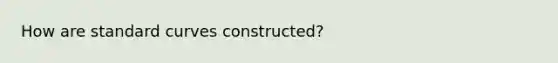 How are standard curves constructed?