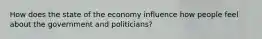 How does the state of the economy influence how people feel about the government and politicians?