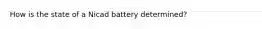 How is the state of a Nicad battery determined?