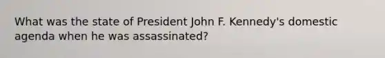 What was the state of President John F. Kennedy's domestic agenda when he was assassinated?