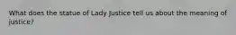 What does the statue of Lady Justice tell us about the meaning of justice?