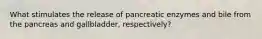 What stimulates the release of pancreatic enzymes and bile from the pancreas and gallbladder, respectively?