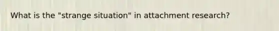 What is the "strange situation" in attachment research?