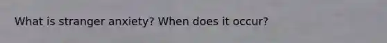 What is stranger anxiety? When does it occur?