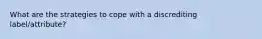 What are the strategies to cope with a discrediting label/attribute?