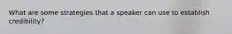 What are some strategies that a speaker can use to establish credibility?