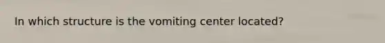 In which structure is the vomiting center located?