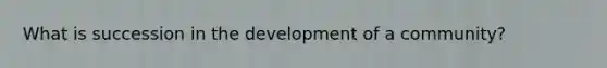 What is succession in the development of a community?