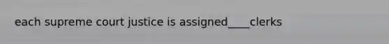 each supreme court justice is assigned____clerks