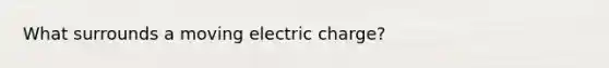 What surrounds a moving electric charge?