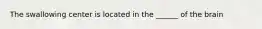 The swallowing center is located in the ______ of the brain