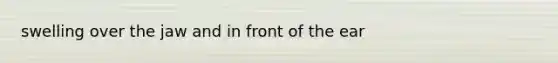 swelling over the jaw and in front of the ear