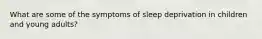What are some of the symptoms of sleep deprivation in children and young adults?