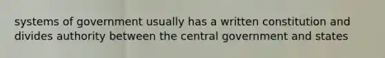 systems of government usually has a written constitution and divides authority between the central government and states