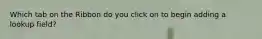 Which tab on the Ribbon do you click on to begin adding a lookup field?