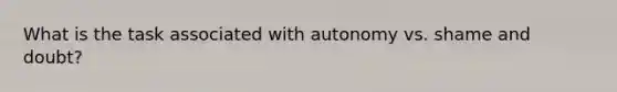 What is the task associated with autonomy vs. shame and doubt?