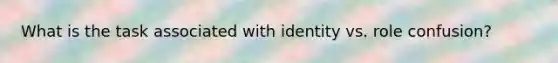 What is the task associated with identity vs. role confusion?