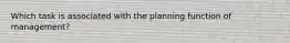 Which task is associated with the planning function of management?