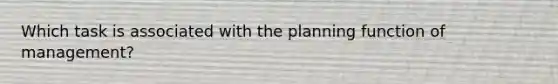 Which task is associated with the planning function of management?