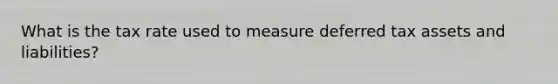 What is the tax rate used to measure deferred tax assets and liabilities?