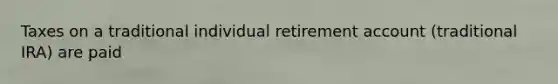 Taxes on a traditional individual retirement account (traditional IRA) are paid