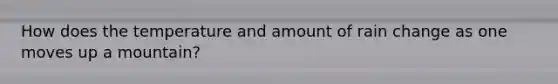 How does the temperature and amount of rain change as one moves up a mountain?