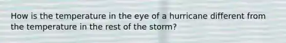 How is the temperature in the eye of a hurricane different from the temperature in the rest of the storm?