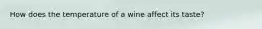 How does the temperature of a wine affect its taste?