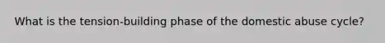 What is the tension-building phase of the domestic abuse cycle?