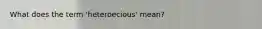 What does the term 'heteroecious' mean?