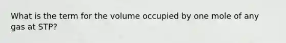 What is the term for the volume occupied by one mole of any gas at STP?