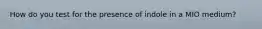 How do you test for the presence of indole in a MIO medium?