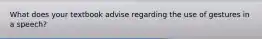 What does your textbook advise regarding the use of gestures in a speech?
