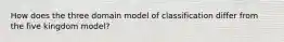 How does the three domain model of classification differ from the five kingdom model?