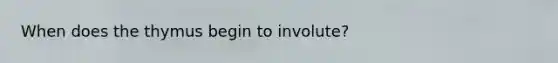 When does the thymus begin to involute?