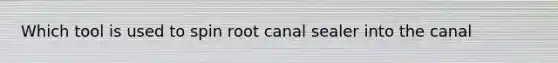 Which tool is used to spin root canal sealer into the canal