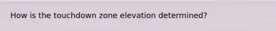 How is the touchdown zone elevation determined?