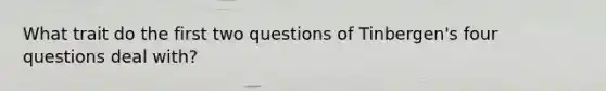 What trait do the first two questions of Tinbergen's four questions deal with?