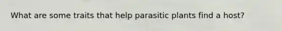 What are some traits that help parasitic plants find a host?