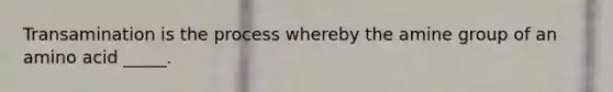 Transamination is the process whereby the amine group of an amino acid _____.