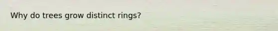Why do trees grow distinct rings?
