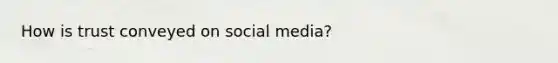 How is trust conveyed on social media?