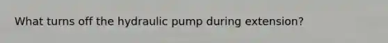 What turns off the hydraulic pump during extension?