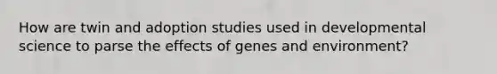 How are twin and adoption studies used in developmental science to parse the effects of genes and environment?