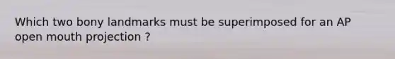 Which two bony landmarks must be superimposed for an AP open mouth projection ?