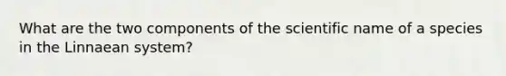 What are the two components of the scientific name of a species in the Linnaean system?