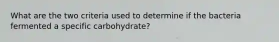 What are the two criteria used to determine if the bacteria fermented a specific carbohydrate?