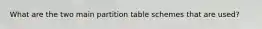 What are the two main partition table schemes that are used?